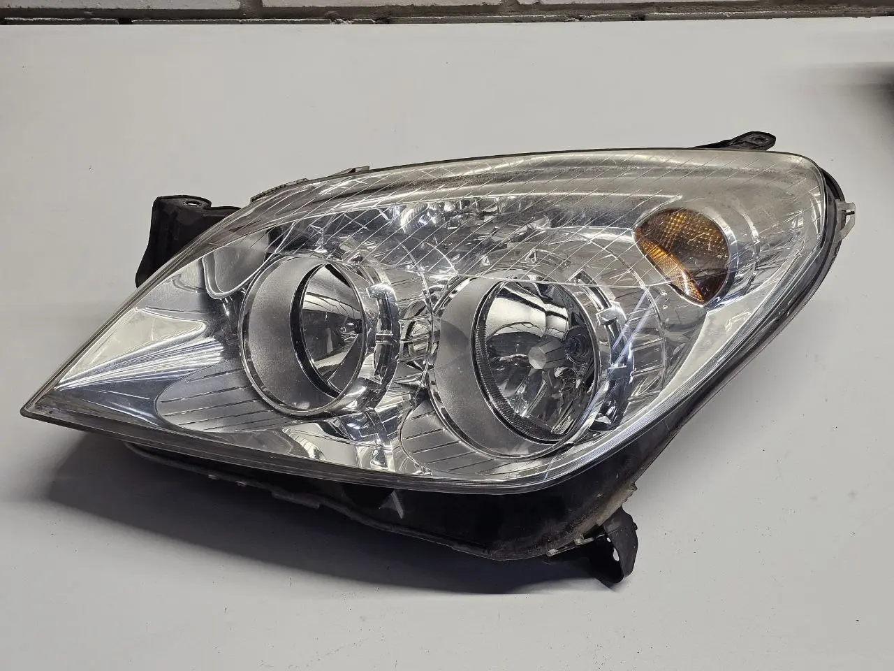 Scheinwerfer links ASTRA-H 1.6 DOHC 2007 1EG27037041