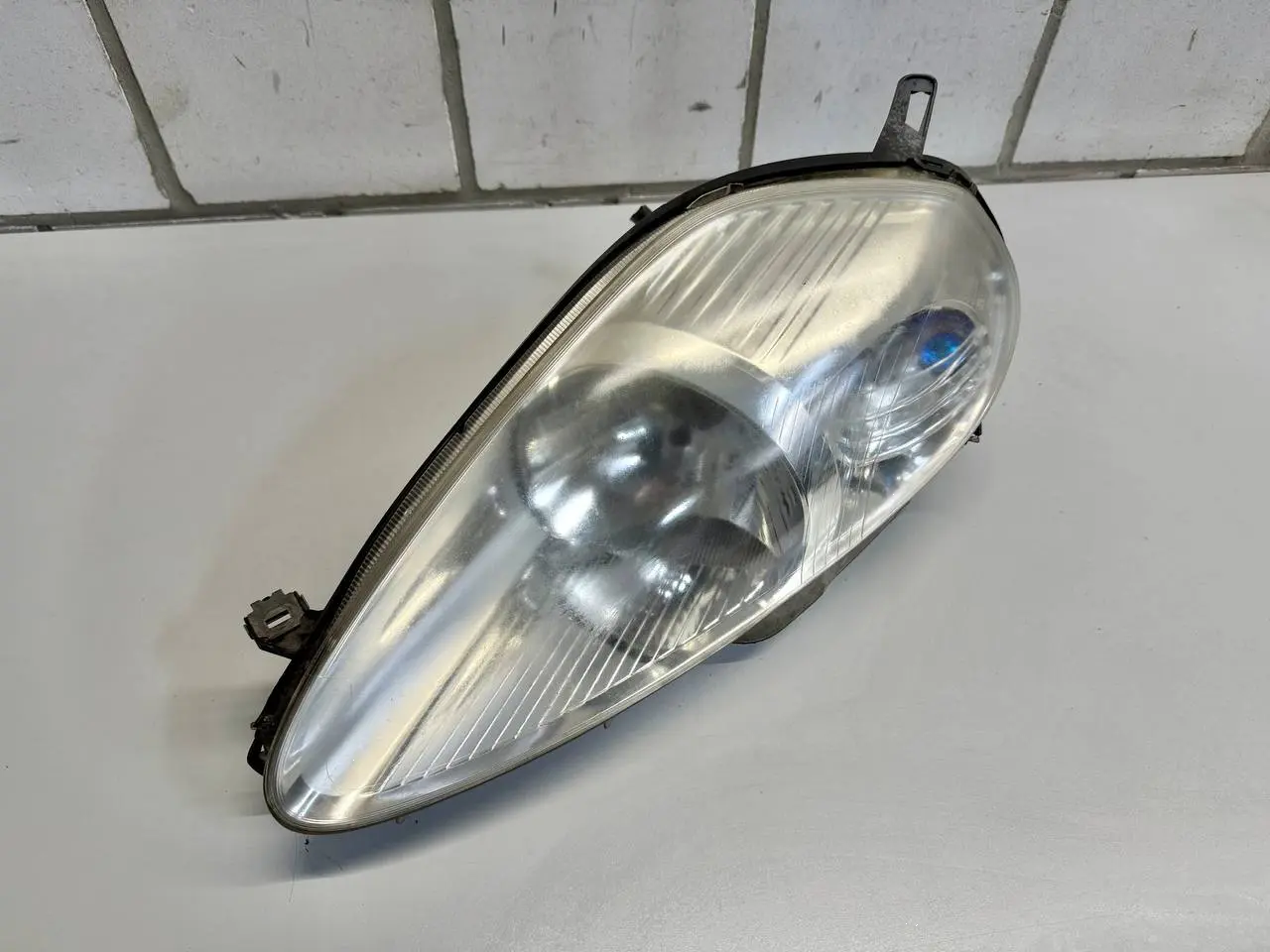 Scheinwerfer links FIAT GrandPunto 1.4 2006 89101387