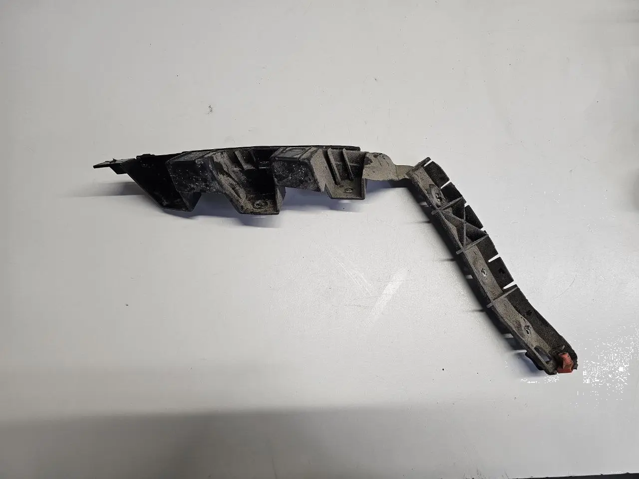 Halter Traeger Fuehrungsschiene Stoßstange Opel Corsa D 1.2L 2008 13179904