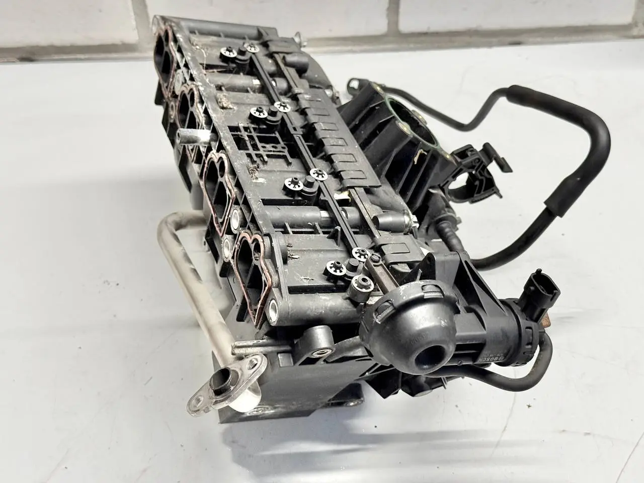 Ansaugbrücke Ansaugkrümmer Luftansaugkrümmer Opel Corsa D 1.2L 2008 0280600063